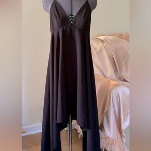 Like new Halston Asymmetrical halter dress. Back hook and eye closure